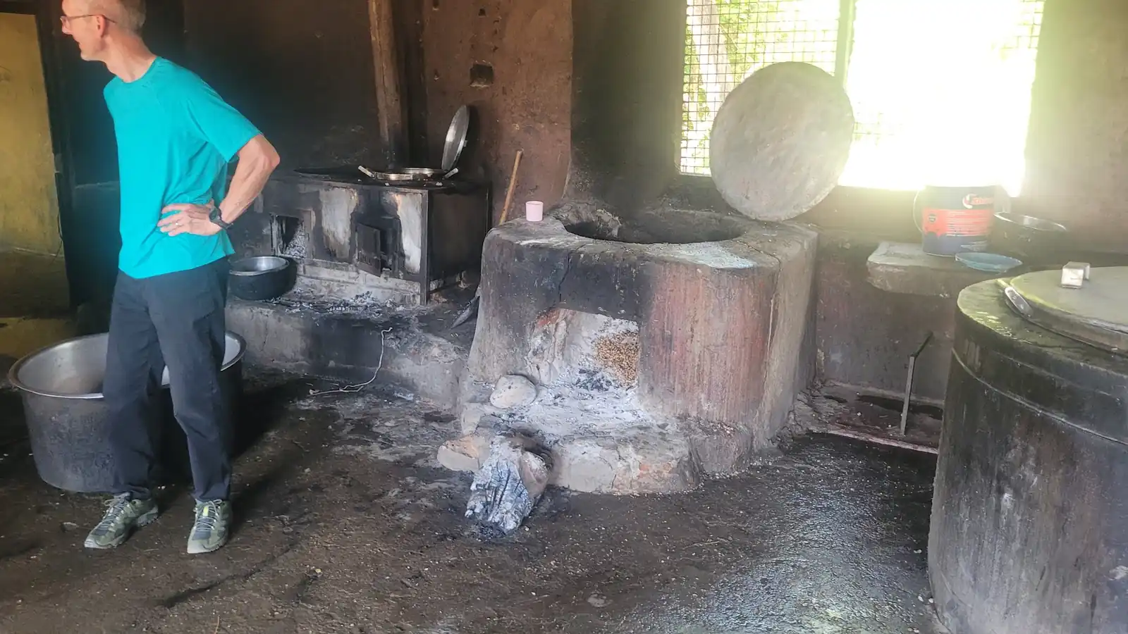 Cooking pots and firewood in the kitchen