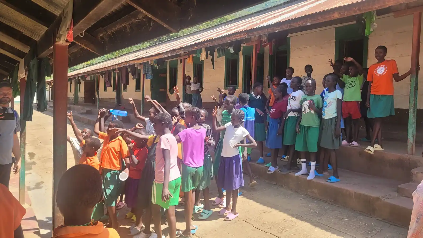 Pupils along the classroom veranda